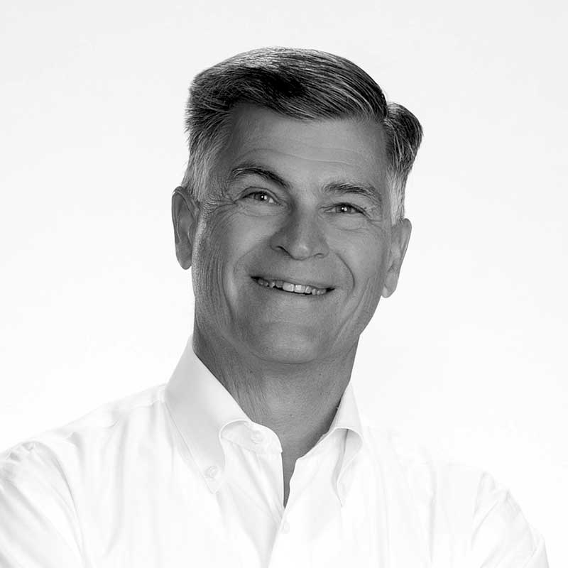 A black and white photo of the Principal and Chief Financial Officer for LDK Ventures, Frank Myers.