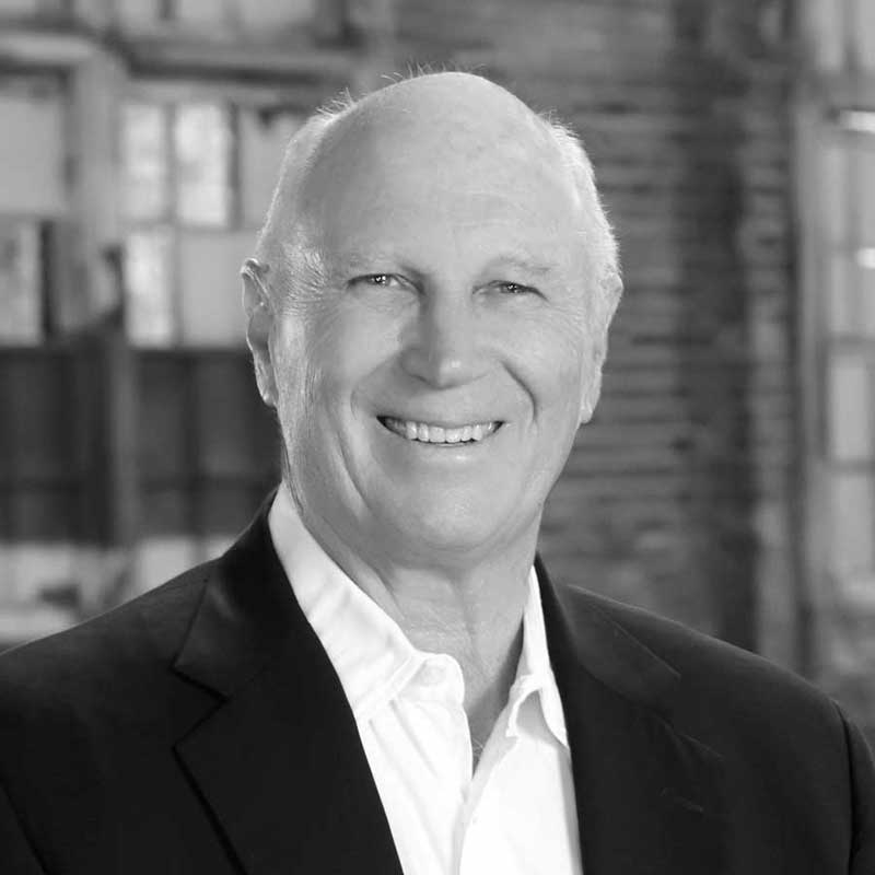 A black and white photo of the Founder and Chairman of LDK Ventures, Larry Kelley.