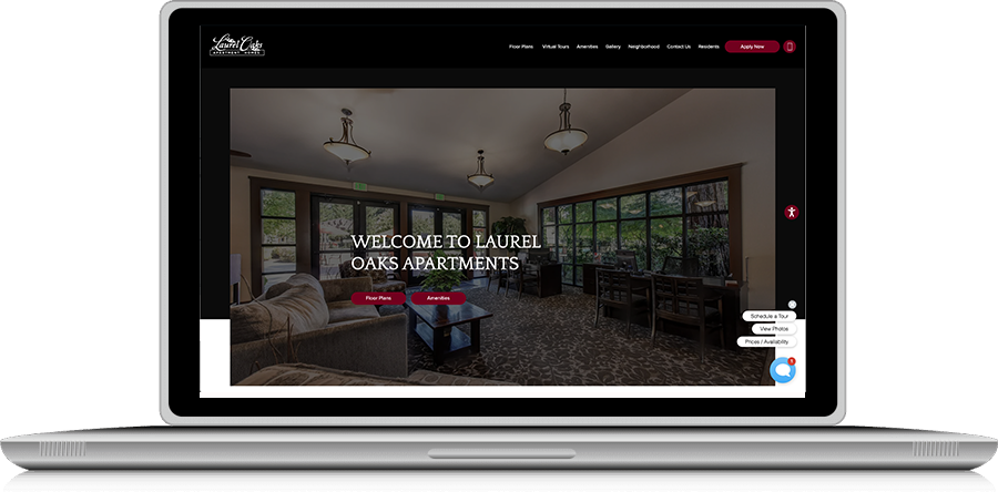 image of laptop displaying home page of laurel oaks apartments