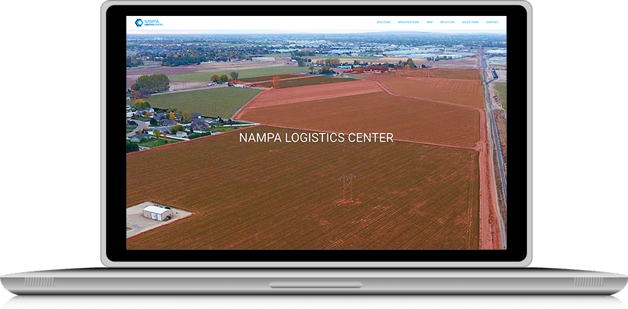 image of laptop displaying home page of nampa logistics center
